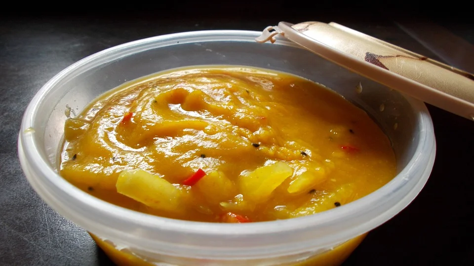 Delicious pumpkin soup in a container