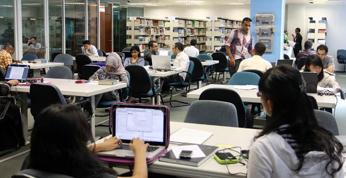 APU students in the library.
